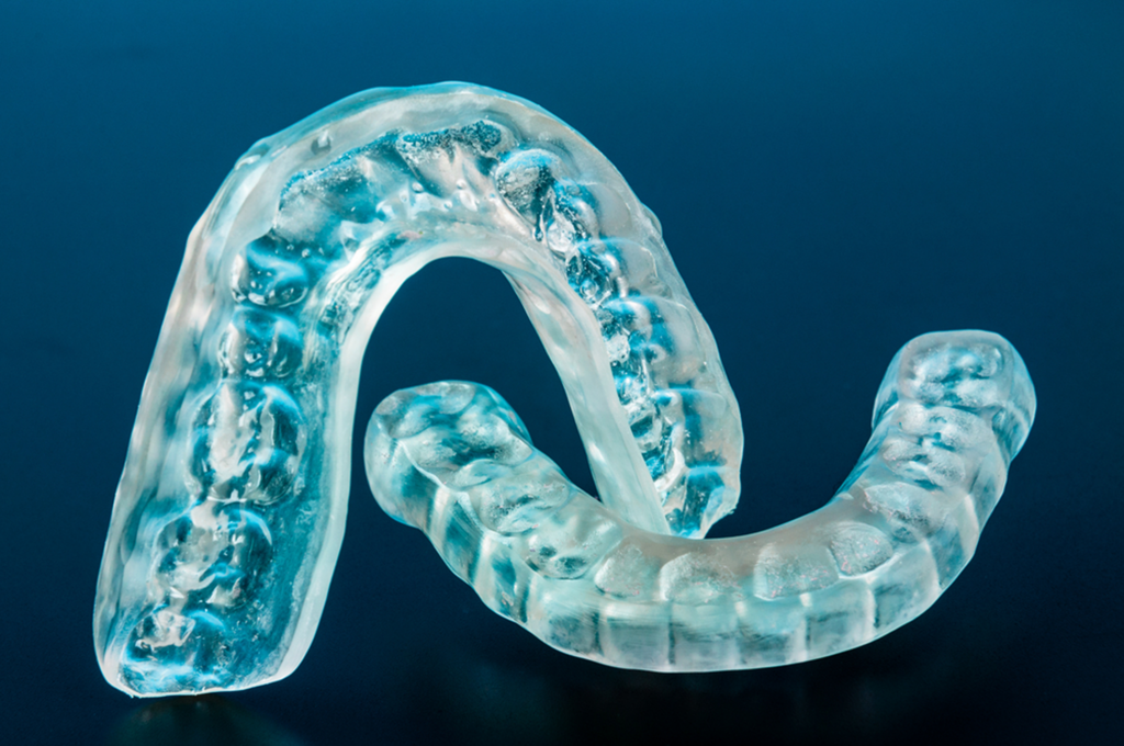the benefits of wearing a custom mouthguard at night