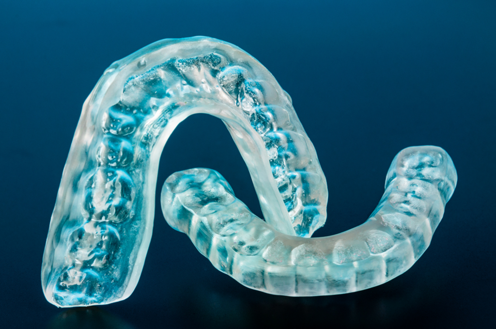 The Benefits of Wearing a Custom Mouth Guard at Night - Albany Dental